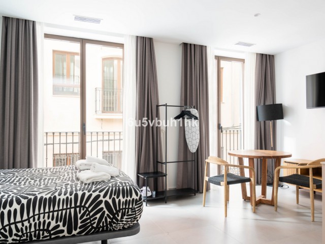 Maison mitoyenne avec 15 Chambres  à Málaga